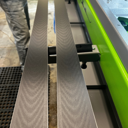 A pair of race skis fresh off the Wintersteiger Scout ski tuning machine