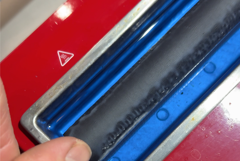 Image of a wax roller at various temperatures that are not hot enough yet to use it on skis.