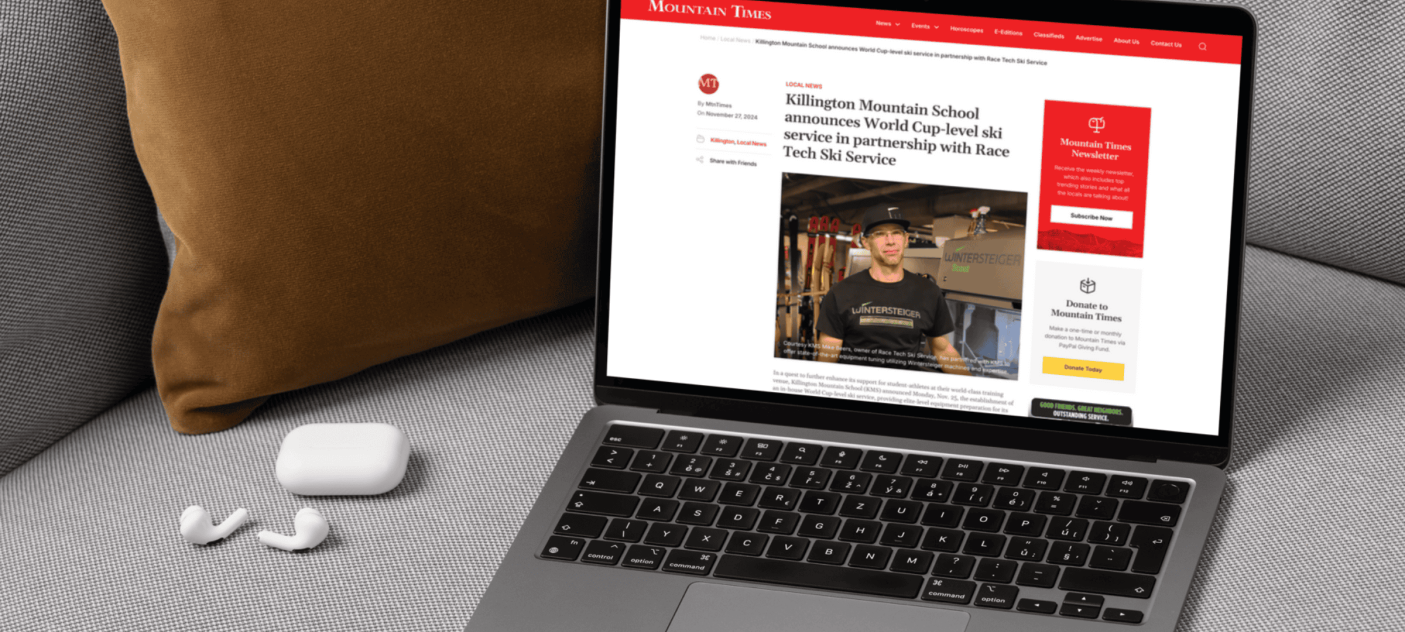 Laptop with The Mountain Times webpage showing Race Tech - KMS partnership article