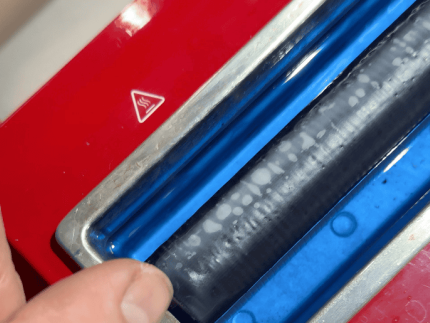 Wax roller not hot 1 A roller on a wax roller that is not hot enough to use yeton