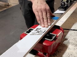 Waxing a Head race ski using a Swix Waxing Machine